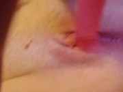 Babe uses pretty pink dildo