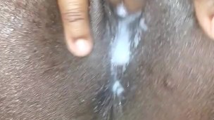 Playing with my pussy after a creampie 