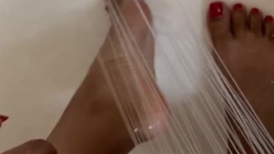 Washing My Sexy Red Christmas Toes 