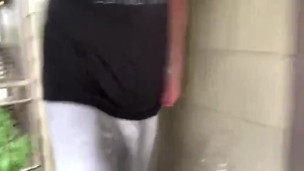 Freeballing in grey sweats showing VPL 