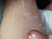 Shooting a big load of cum on my leg.