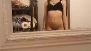 Slutty teen babe strips in bathroom
