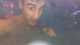 Twink tries hydromassage nozzle on his uncut cock in public pool underwater