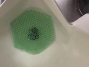 Almost Caught in action at the urinal Pinching off/on Janitor saw wet floor