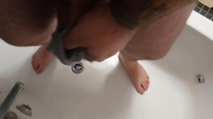 Pissing my pants in the bath, then cumming in them