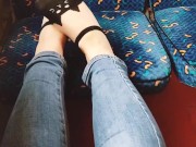  plays with her feet in the train. Public foot fetish