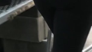 Candid following sexy cougar MILF in tight yoga pants who teases her ass