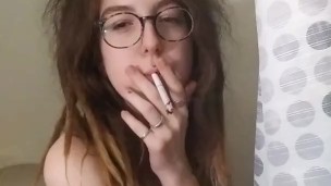 Sexy dread head smoking in the shower