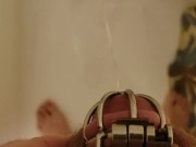Guy Pees in the Shower while still in Chastity