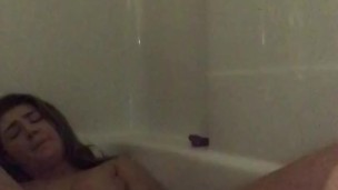 teen Shows Off Her Tits Before She Fucks Herself In The Bathtub