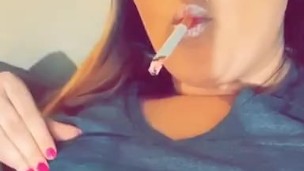 Hot Cam Girl Smokes While Rubbing Her Tits