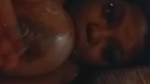 Ebony plays with big boobs