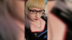 Blonde Geek Girl in Latex Dress
