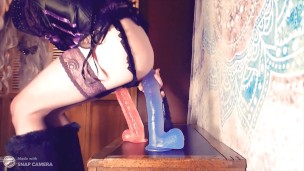 Gothic Gurl playing with Large Dildos