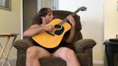 Nude Hairy Stud Guitar Playing