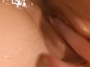 Rubbing my pussy in the bath