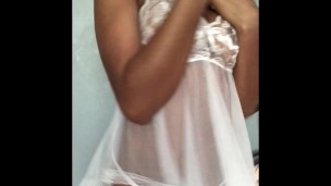 Black Teen twirls in white lingerie