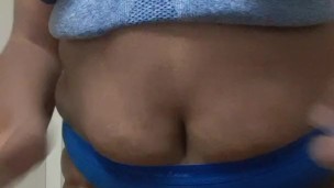 Popping Out of A Blue Sports Bra