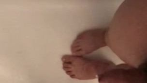 Small uncut cock feet play in shower part 2