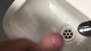 Teen masturbates and cums in public toilet