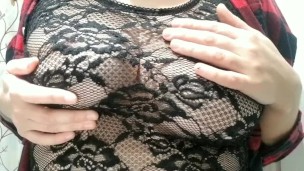 Breast massage through lace shirt