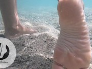 Playfull feet underwater