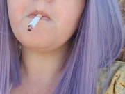 Hot big tittied giantess smokes a fag outside by the pool 
