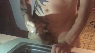 Tattooed twink gay jerking off morning wood at sink