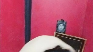 teen crossdresser in a tight black dress