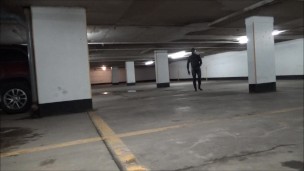wetsuited & masked in parking garage