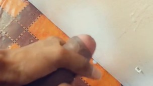 Hung twink shooting cum on bedroom wall