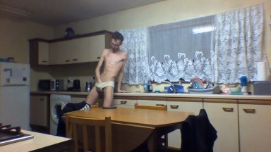 VERY SKINNY TEEN WEARS HIS STEPMOMS PANTIES AND MASTURBATES IN THE KITCHEN!