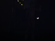 Blond guy spins fire on rooftop in socks and underwear 2/16