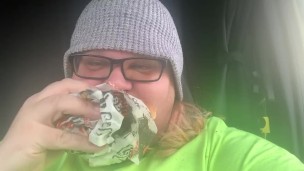 Fat tranny slut stuffs fat face