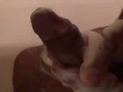 Releasing a big load in the shower (slow-mo)