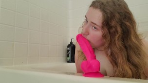 Big natural tits amateur give sloppy blowjob to dildo in bathtub