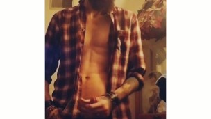 Bearded muscular guy jerking off cums and eats it