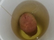 pissing in a cup from the bottom and letting it drip down my balls