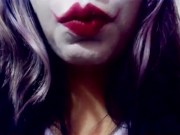 Harley Quinn playing with her mouth 10/16