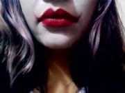 Harley Quinn playing with her mouth 14/16