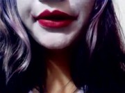 Harley Quinn playing with her mouth 15/16