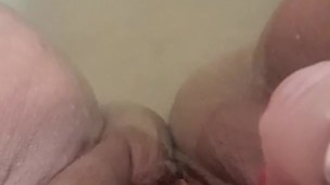 Spreading my chubby little blonde pussy in the bath