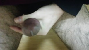 Masturbation with a penis ring.