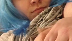 Girl with colored hair plays with her big fat tits