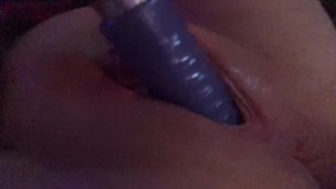 teasing herself with dildo