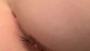 Redhead fucks herself from behind