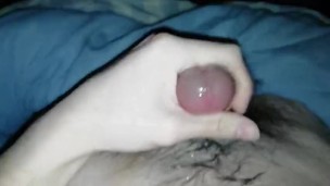 Masturbating in the bedroom.