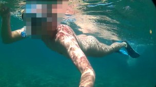 Nude diving and snorkeling in the sea
