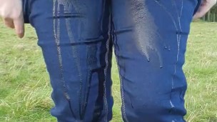 Gf wets her Jean's walking in the countryside then Pulls her Jean's down! 