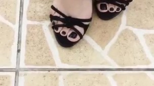 tici_feet @tici_feet IG tici feet showing black sandal and black toenails